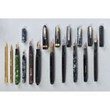 A COLLECTION OF NINE VINTAGE FOUITAIN PENS AND A CONWAY STEWART BALLPOINT AND PENCIL SET, these