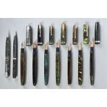 SEVEN PARKER VACUMATIC FOUNTAIN PENS and two propelling pencils, these are mostly laminated