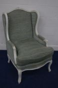 A MODERN WHITE PAINTED FRENCH WINGED ARMCHAIR, with green tartan upholstery, width 70cm