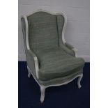 A MODERN WHITE PAINTED FRENCH WINGED ARMCHAIR, with green tartan upholstery, width 70cm