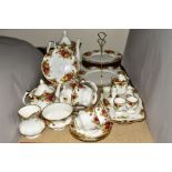 A QUANTITY OF ROYAL ALBERT OLD COUNTRY ROSES TEA AND COFFEE WARES, comprising a two tier cake stand,