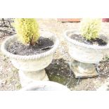 A PAIR OF MODERN COMPOSITE TWO PIECE GARDEN PLANTERS with rope edge and foliate detail with small