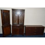 A MODERN MAHOGANY TWO DOOR BOOKCASE with two drawers (key, sd), similar corner cupboard and an oak