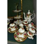 A ROYAL ALBERT OLD COUNTRY ROSES COFFEE SERVICE, comprising a three tier cake stand, coffee pot,