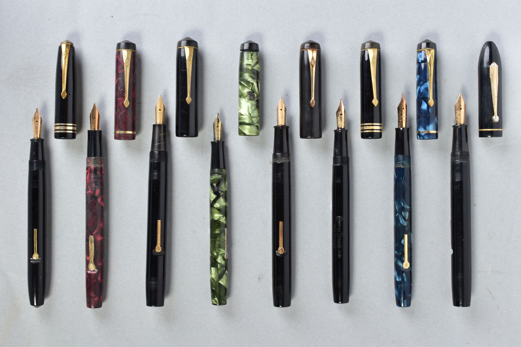 A COLLECTION OF VINTAGE EIGHT CONWAY STEWART FOUNTAIN PENS including a No 475 in black, a No 286