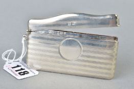 A GEORGE V SILVER CARD CASE, rectangular with serpentine hinged top, engine turned decoration,