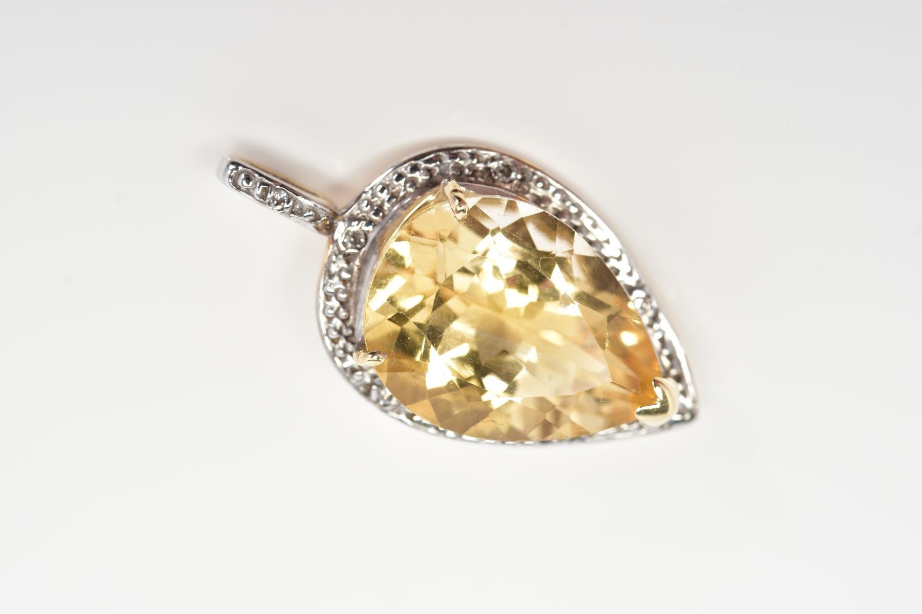 A 9CT GOLD PENDANT, designed with a pear cut citrine within a raised three claw setting and - Image 2 of 4