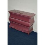 A MODERN DUSKY PINK BOMBE THREE DRAWER COMMODE, with silvered Rococco style handles (detached),