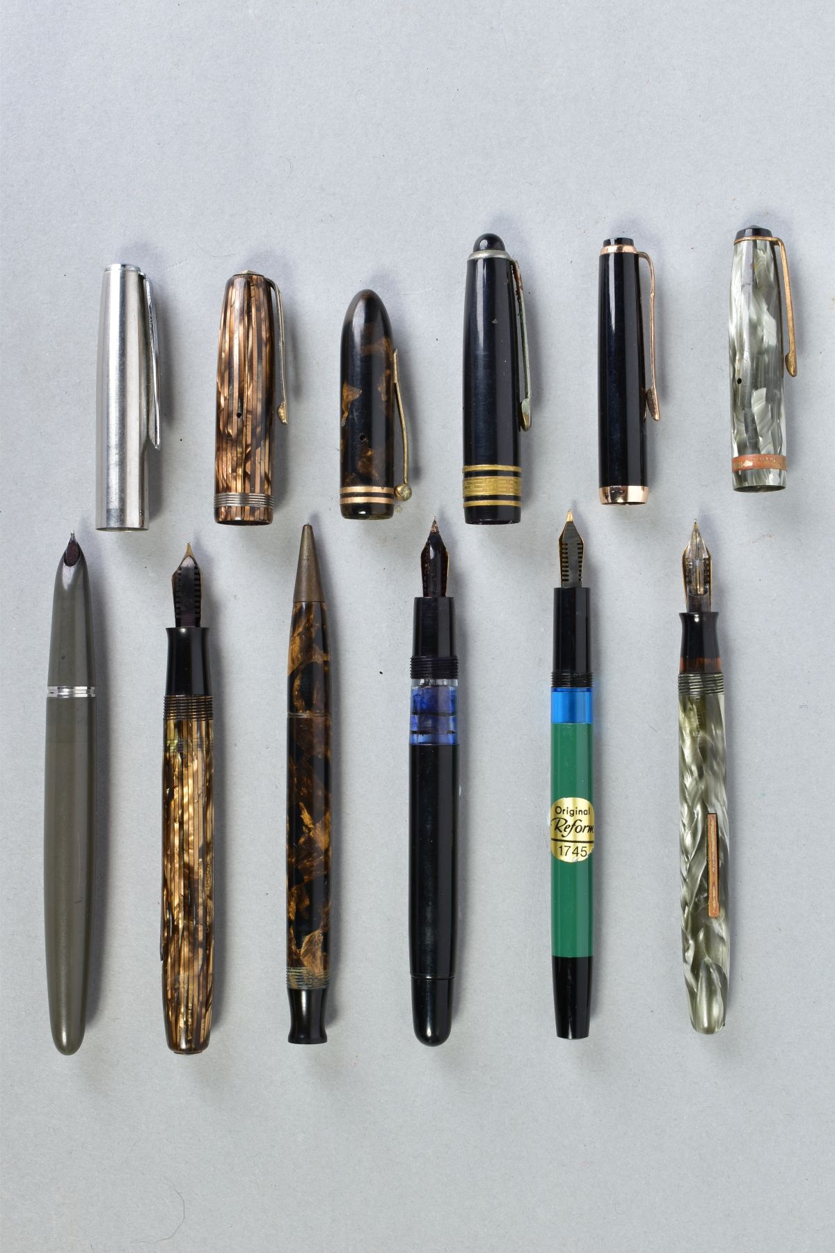 A COLLECTION OF SIX VINTAGE FOUNTAIN PENS including a Moore 94A in striped golden brown with a - Image 2 of 2