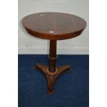 A VICTORIAN ROSEWOOD CIRCULAR TOPPED OCCASIONAL TABLE on an octagonal tapering support and a triform