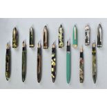 SEVEN VINTAGE SHEAFFER FOUNTAIN PENS including two marbled green with no identifying numbers, two
