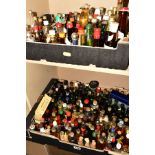 A COLLECTION OF APPROXIMATELY TWO HUNDRED AND THIRTY FIVE MINIATURE BOTTLES OF WHISKY, COGNAC, PORT,