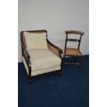 A 19TH CENTURY MAHOGANY BEGERE GENTLEMANS ARMCHAIR, with scrolled arm rests, later added carved