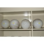 A SET OF FOUR OPAQUE WHITE GLASS SPHERICAL CEILING LIGHT SHADES WITH OVERPAINTED NICKEL PLATED