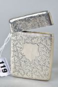 A LATE VICTORIAN SILVER CARD CASE, of rectangular form, engraved with leaf decoration, vacant