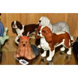 FOUR BESWICK DOGS, 'Yorkshire Terrier' No1944, 'King Charles Spaniel', 'Blenheim' No 2107A,