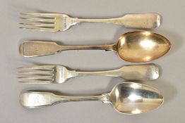 A PAIR OF GEORGE III IRISH SILVER FIDDLE PATTERN TABLEFORKS, engraved crest and motto, makers