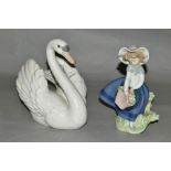 TWO LLADRO FIGURES, a swan with wings spread, No5231, designed by Francisco Catala, height 17.5cm,