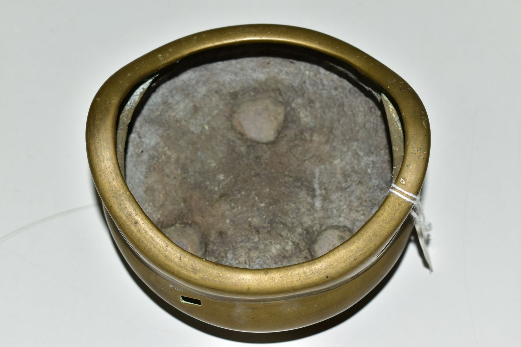 A CHINESE POLISHED BRONZE TRIPOD CENSER, 18th / 19th Century, looped handles, cast mark to - Image 4 of 7