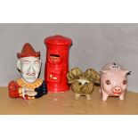 FOUR MONEY BOXES, comprising a reproduction cast iron clown money box and three ceramic money