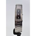 A LADIES MAUBOUSSIN WRISTWATCH IN STAINLESS STEEL AND DIAMOND, oblong case measuring 32mm x 17.