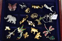 A SELECTION OF COSTUME JEWELLERY BROOCHES, to include various animal designs, an elephant set with