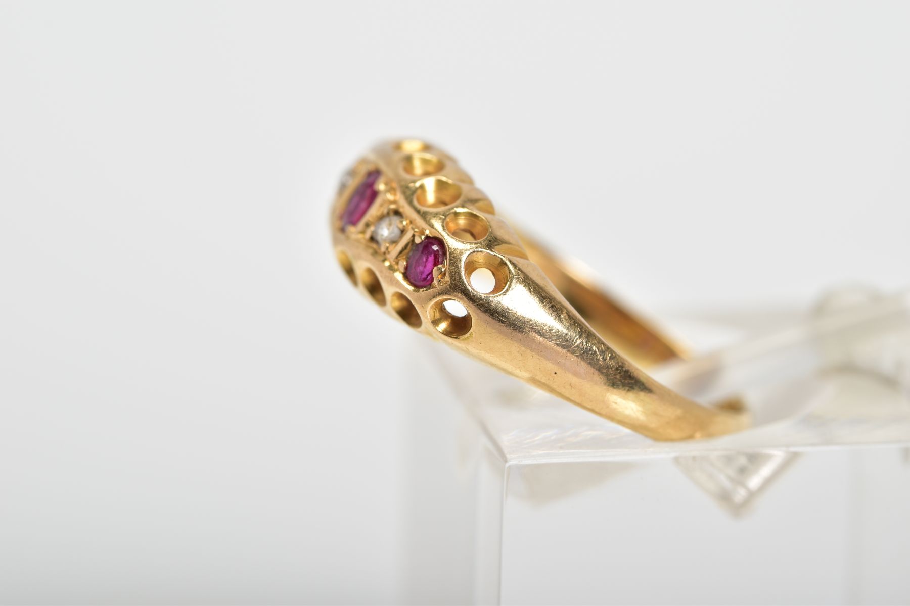 AN EARLY 20TH CENTURY 18CT GOLD RUBY AND DIAMOND RING, the boat shaped top panel set with a line - Image 2 of 3
