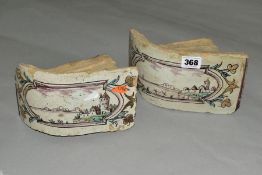 A PAIR OF 18TH CENTURY FAIENCE ROUNDED CORNER FIREPLACE TILES/BRICKS, both painted with landscapes