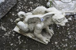 A COMPOSITE GARDEN FIGURE IN THE FORM OF A MYTHICAL WINGED CREATURE, length 66cm