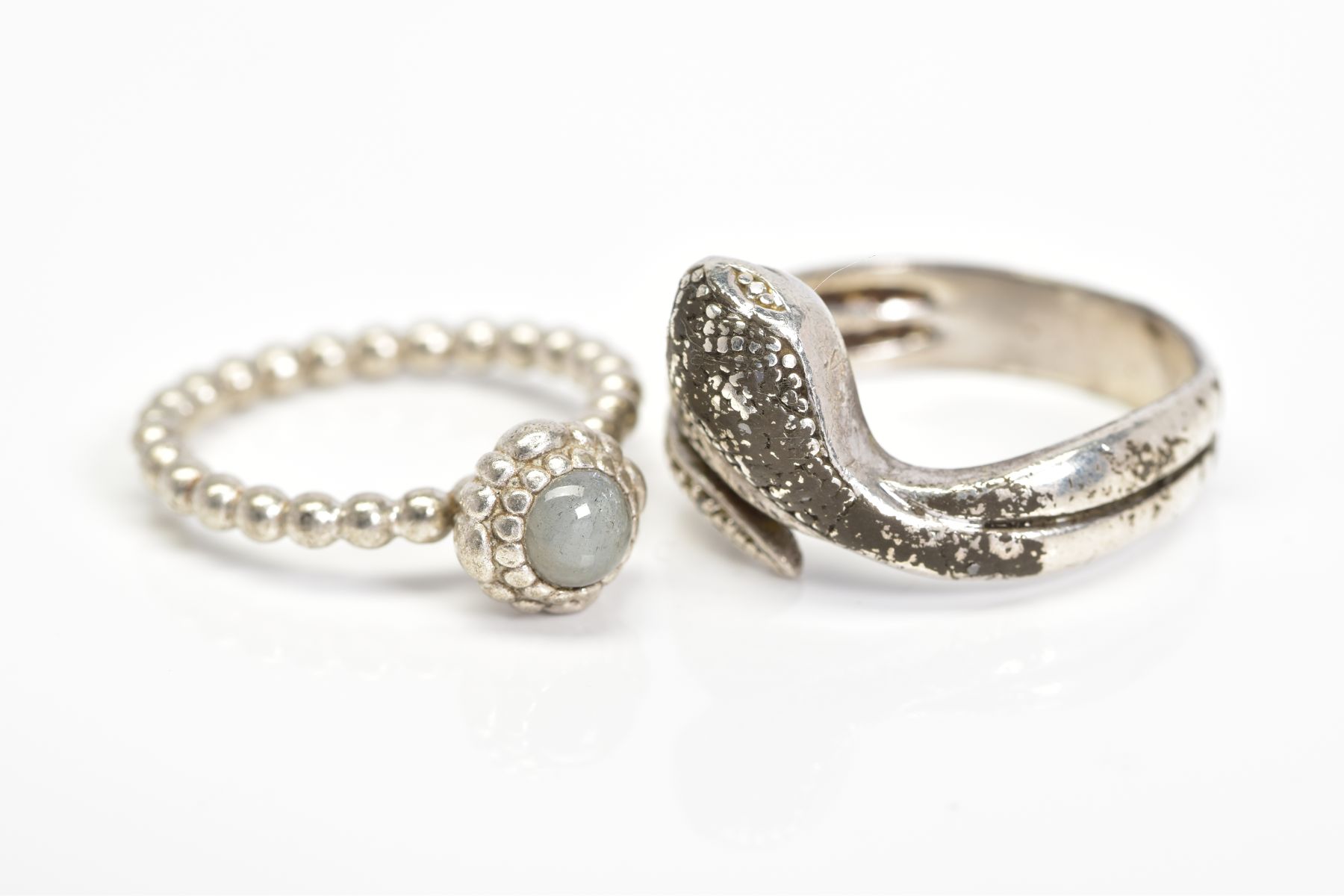 A PANDORA RING AND A SNAKE RING, the Pandora ring designed with a circular rock crystal cabochon - Image 3 of 4