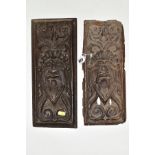 TWO CARVED TREEN PANELS, of rectangular form, 17th Century and later, carved with identical mask and