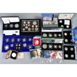 A CARDBOARD BOX CONTAINING UK ROYAL MINT COIN PROOF SETS to include two three cased one pound silver