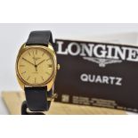 A GENTS GOLD PLATED LONGINES WRISTWATCH, round case measuring 34mm, champagne dial signed