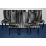 A SET OF EIGHT STRIPPED WHITE AND BLACK DINING CHAIRS, with label reading Marina (sd)