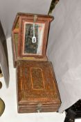 TWO 19TH CENTURY INDIAN TRAVELLING MIRRORS, the rectangular cases with painted and varnished