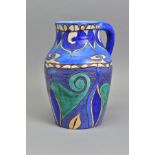 A CLARICE CLIFF VASE WITH HANDLE, signed to the base under glaze 'Inspiration Bizarre by Clarice