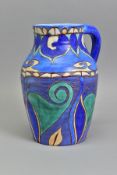 A CLARICE CLIFF VASE WITH HANDLE, signed to the base under glaze 'Inspiration Bizarre by Clarice