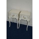 A PAIR OF CREAM AND GILT SINGLE DRAWER BEDSIDE CABINETS on cabriole legs