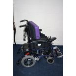 A LLOYDS PHARMACY ELECTRIC WHEELCHAIR and a Power Stroll two wheeled motor with battery but no