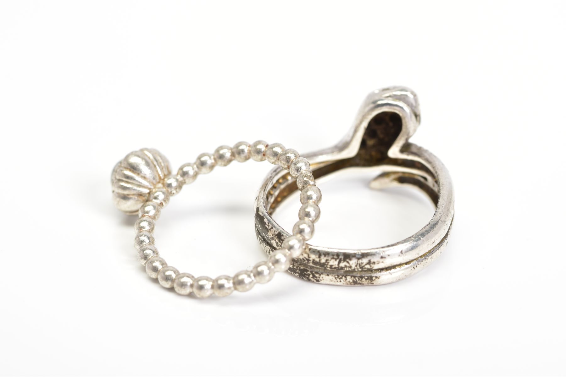 A PANDORA RING AND A SNAKE RING, the Pandora ring designed with a circular rock crystal cabochon - Image 2 of 4