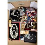 A SELECTION OF COSTUME JEWELLERY, to include a colourless paste necklace and earring set, together