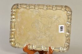 AN EDWARDIAN SILVER RECTANGULAR TRAY, pie crust edge, engraved with an eagle on a branch, on four