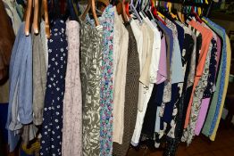 A LARGE COLLECTION OF LADIES WEAR, to include knitwear, skirts, trousers, etc, in sizes 14, 16 and