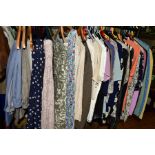 A LARGE COLLECTION OF LADIES WEAR, to include knitwear, skirts, trousers, etc, in sizes 14, 16 and