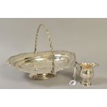 A LATE VICTORIAN SILVER PLATED WALKER & HALL OVAL SWING HANDLED CAKE BASKET, together with a