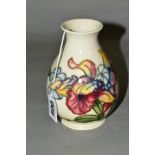 A MOORCROFT POTTERY BALUSTER SHAPED VASE, 'Orchid' pattern on cream ground, impressed and painted