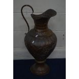 A LARGE BEATON COPPER WATER JUG with a scrolled handle, height 75cm