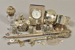 A QUANTITY OF SILVER ITEMS, including two napkin rings, silver handled button hooks, two silver