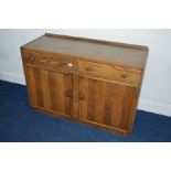 A 1940'S OAK SIDEBOARD with two drawers, width 121cm x depth 47cm x height 83cm