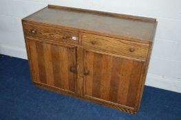 A 1940'S OAK SIDEBOARD with two drawers, width 121cm x depth 47cm x height 83cm